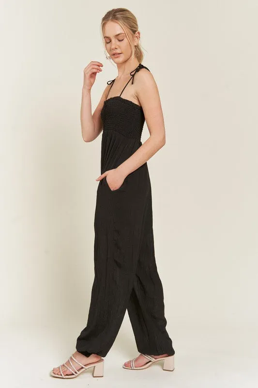 SMOCKED TIE STRAP JUMPSUIT