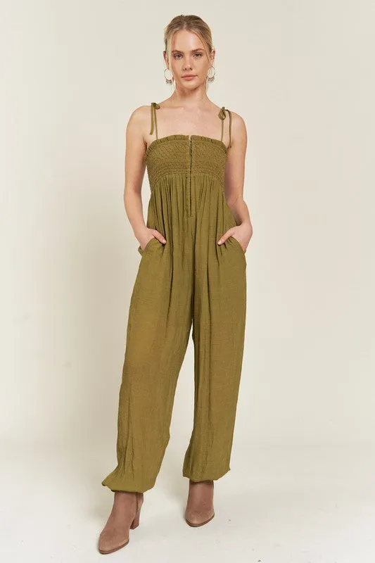 SMOCKED TIE STRAP JUMPSUIT